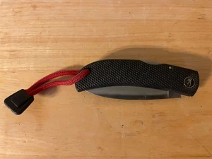 BROWNING Knife Made In Japan Model 704 Lockback SERRATED Edge Blade Black Handle - Picture 1 of 6