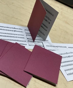 8 Doll Sized Music Books Burgundy Cardstock W/ Musical Score Inside 2” X 2 3/8” - Picture 1 of 7