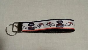 Handcrafted NFL Denver Broncos Football Key Chain Wristlet NEW - Picture 1 of 1