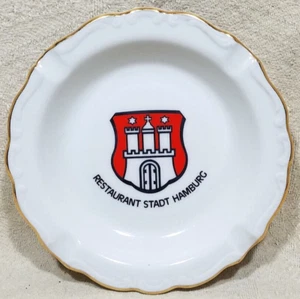 "CENICERO DE COLECCIÓN RESTAURANTE STADT HAMBURGO ORO BLANCO ACABADO FINO CHINA 6,5""x 3/4"" - Imagen 1 de 12
