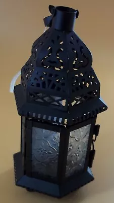 MOROCCAN STYLE VOTIVE CANDLE LANTERN. CLEAR GLASS. 8.5 INCHES HANG OR STAND  - Image 1 of 3