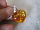 Cognac Amber heart pendant, 27 mm x 24 mm, in 2.26 grams of 925 Sterling Silver