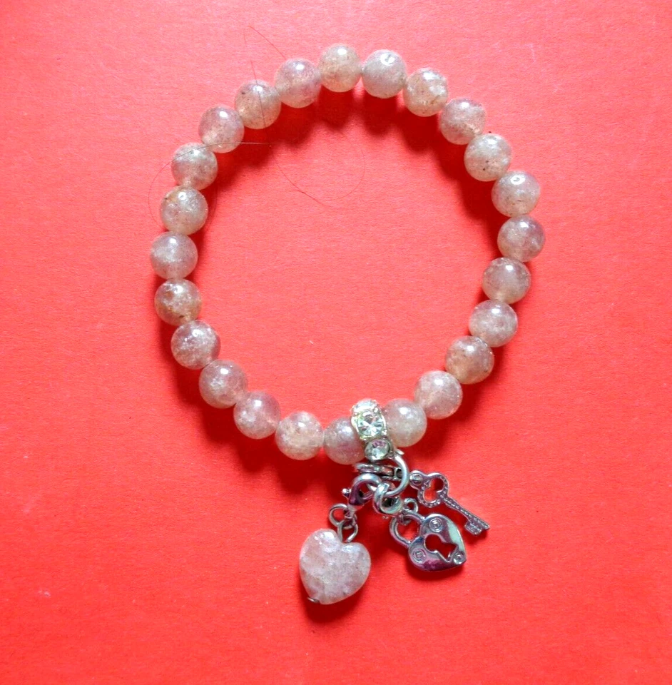 HCA Armband mit Echtsteinen ROSENQUARZ gefärbt ECHTSTEINPERLEN mit 3 Anhängern - Bild 1 von 1