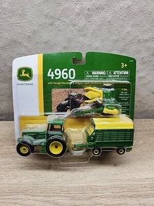 ERTL John Deere 1:64 Scale Model 4960 Tractor w/ Harvester + Wagon - Picture 1 of 2