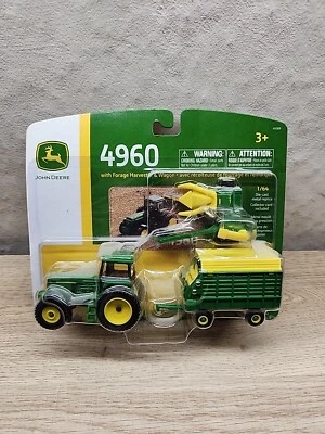 ERTL John Deere 1:64 Scale Model 4960 Tractor w/ Harvester + Wagon - Image 1 of 2