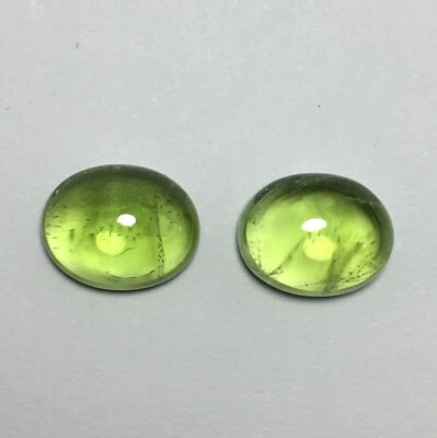 Exquisite green peridot oval cabochon gemstone pair good color 7.55 carat - Image 1 of 4