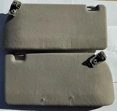 Nissan Xterra Frontier 2005-12 Driver & Passenger Gray Cloth Sun Visors OEM - Image 1 of 2