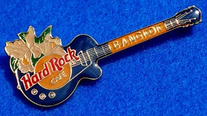 GUITARRA BANGKOK ESMALTE BLANCO ORQUÍDEA TAILANDESA AZUL GIBSON LES PAUL PIN Hard Rock Café - Imagen 1 de 1