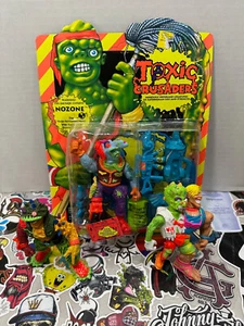 1990 Modellino Toxic Crusaders Nozone nuovo con scatola non perforato - Foto 1 di 7