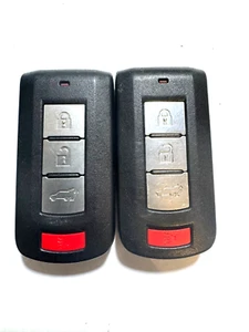 OEM MITSUBISHI KEYLESS ENTRY REMOTE KEY FOB OUC644M-KEY-N 8637A817 2 PACK - Picture 1 of 2