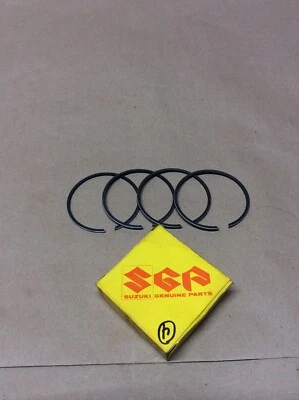Suzuki T305 TC350 1968 anillo de pistón 1,0 O/S conjunto fabricante original nos 12140-18710 Foto 1 de 3