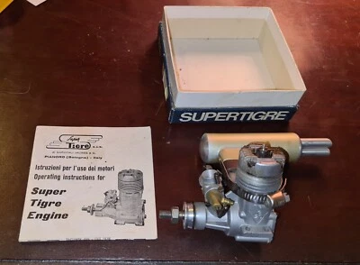 Super Tigre G 20 / .23 Glow Fuel Engine    1960s nrMIB w/ pipe muffler Exhaust - Image 1 of 4