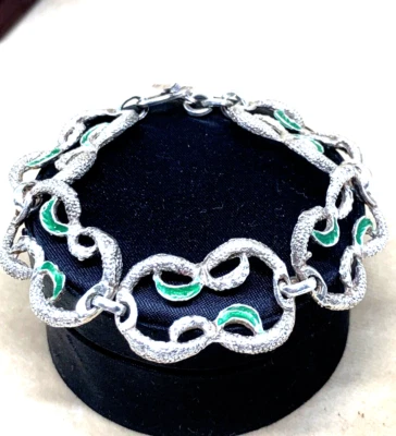 GRANDE BRACCIALE ANNI 70 CON ELEMENTI A FOGLIE CON SMALTO VERDE MELA ARGENTO 800 - Immagine 1 di 4