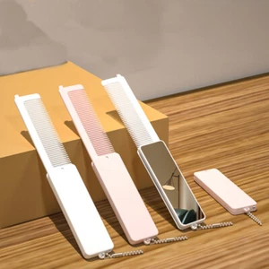 2-teiliges Reisehaarbürste mit spiegelkompaktem Klappkamm & Minibürsten-Set, rosa & weiß - Bild 1 von 12