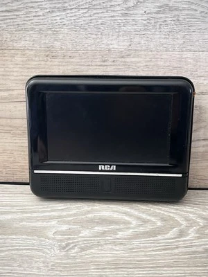 Портативный DVD-плеер RCA DRC69702 (7 дюймов) НЕ ПРОТЕСТИРОВАН БЕЗ АДАПТЕРА - Изображение 1 из 4