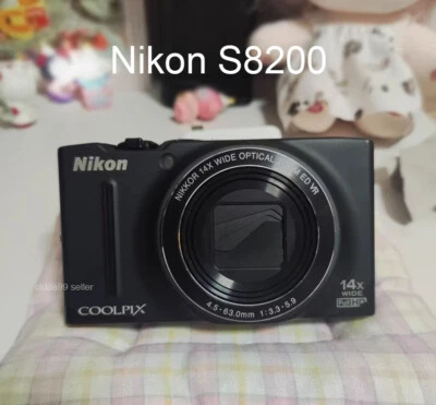 Компактная цифровая камера Nikon COOLPIX S8200 16,1 Мп 14-кратный оптический зум - серебристая/черная - Изображение 1 из 4