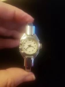 Lugano 1970s Round Swiss Made White Dial Silver tone Case and clamp bracelet - Picture 1 of 5
