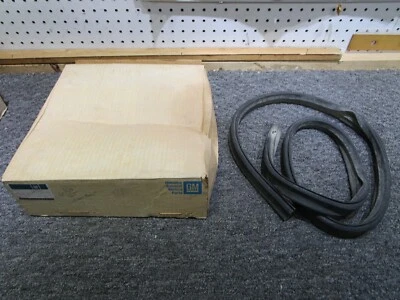 61/62 corvette convertible soft top rear bow weatherstrip GM NOS 3781126 283 327 - Image 1 of 4