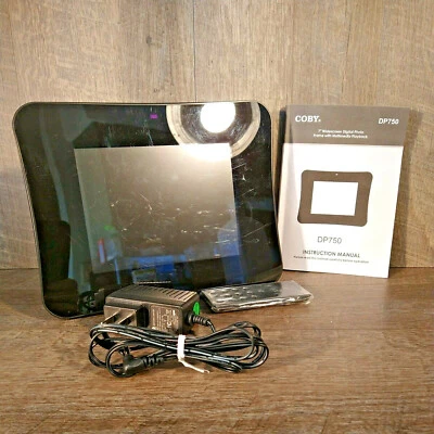 Coby DP750 7" Widescreen Digital Photo Frame w/ Multimedia Playback Modern Frame - Image 1 of 4