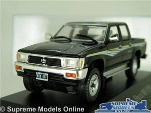 TOYOTA HILUX SR5 MODEL CAR PICK UP TRUCK VAN 1997 BLACK 1:43 SCALE IXO + CASE K8 - Picture 1 of 4