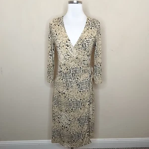 Abito donna avvolgente floreale parallelo media maglia elasticizzata manica lunga - Foto 1 di 10
