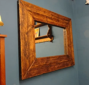 A Rustic Stained Pine Wall Mirror with metal corner brackets - Picture 1 of 7