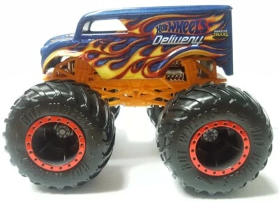 Camión de reparto de lácteos Monster Jam Hot Wheels ruedas gigantes 1:64 diecast suelto  Foto 1 de 4