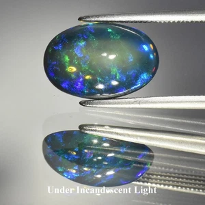 💎 Cabujón ovalado de 2,42 quilates 12,8 x 8,5 mm ópalo negro natural - Juego de colores, gema de Etiopía - Imagen 1 de 5