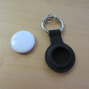 en l'état PIÈCES non réclamées NON TESTÉES apple air tag et housse airtag perdues et trouvées - Photo 1 sur 3