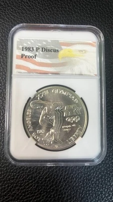 Dólar de plata conmemorativo disco olímpico prueba 1983-S $1  Foto 1 de 2