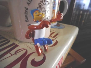 DE COLECCIÓN publicidad NUEVO DE LOTE ANTIGUO FIGURA PVC #401 - CEREAL KELLOGGS - COCO con brazos extendidos - Imagen 1 de 1