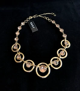 DKNY Gold Tone Necklace Champagne Color Rhinestones Logo Disc Stunning 20" Adj - Picture 1 of 15