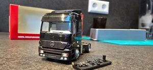 1/87 Herpa MB Actros L 2-Achs-Zugmaschine schwarz OVP - Bild 1 von 5