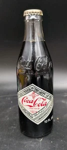 Botella de Coca Cola 1985 75 aniversario - Imagen 1 de 6