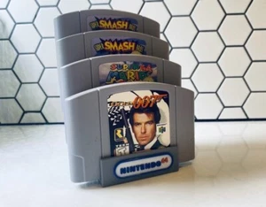 Nintendo N64 SNES SEGA soporte cartucho de juego pantalla retro videojuego pantalla - Imagen 1 de 25