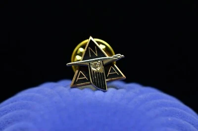 10K Yellow Gold NAA North American Aviation lapel pin with diamond black enamel - Image 1 of 4