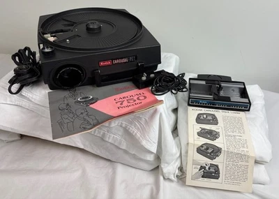 Proyector deslizante de carrusel Kodak 750 con cargador de pila y control remoto funciona probado Foto 1 de 4