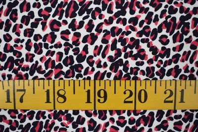 ANIMAL PRINT  ON WHITE  2 WAY STRETCH POLYESTER  KNIT FABRIC  3.5 YARDS - Image 1 of 2