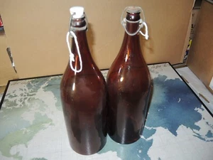 Dos botellas de vidrio ámbar Growler L tapa oscilante jarras de cerveza vintage - Imagen 1 de 5