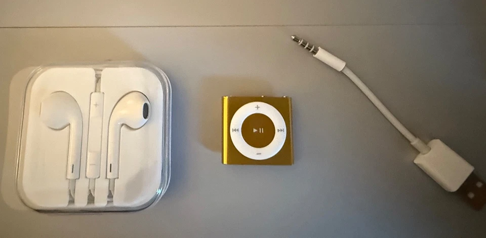 BRAND NEW APPLE IPOD SHUFFLE 4TH GEN 2GB ORANGE – NEW BATTERY INSTALLED - Image 1 of 1