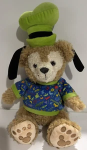 Disney Parks Duffy Oso de Peluche Verde Goofy Oreja Sombrero Azul Disneyland Camisa - Imagen 1 de 8