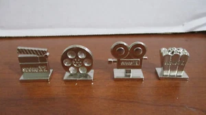 MATTEL~SCENE IT? MOVIE TRIVIA GAME~Set of 4 REPLACEMENT METAL TOKENS MOVERS~2002 - Picture 1 of 3
