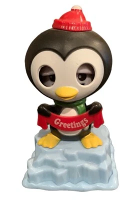 Solar Powered Dancing  Penguin Bobble Head/ Holding Sign "Greetings" - Image 1 of 4