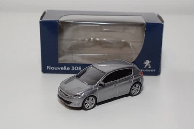 B86 1:64 3 INCH 3 INCH NOREV 314815 PEUGEOT 308 5 PORTE PORTE MET. GRIGIO MIB - Immagine 1 di 4
