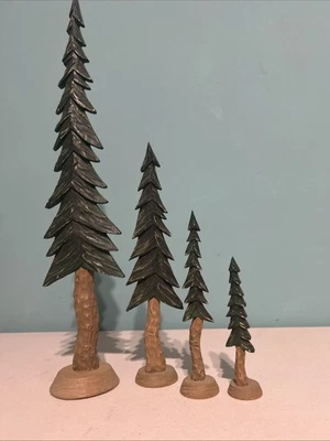 Wooden Carved Tall Skinny Pine Trees Rustic Decor Set of Four Decor - Image 1 of 4
