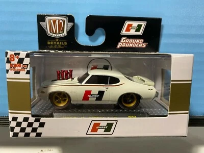 1/64 M2 GROUND POUNDERS 1969 PONTIAC GTO JUDGE HURST WHITE - Image 1 of 3
