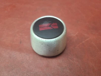 Oldsmobile Calais Firenza 1985-1988 tapacubos central OEM GM 22542917 Foto 1 de 4