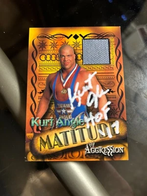 Kurt Angle 2003 Fleer WWE Agression Matitude Mat Relic Signed Auto Autograph HOF - Image 1 of 3