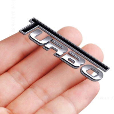 Pegatina 3D Metal Coche Turbo Emblema Guardabarros Trasero Baúl Insignia Carreras Plateada y Negra Foto 1 de 4