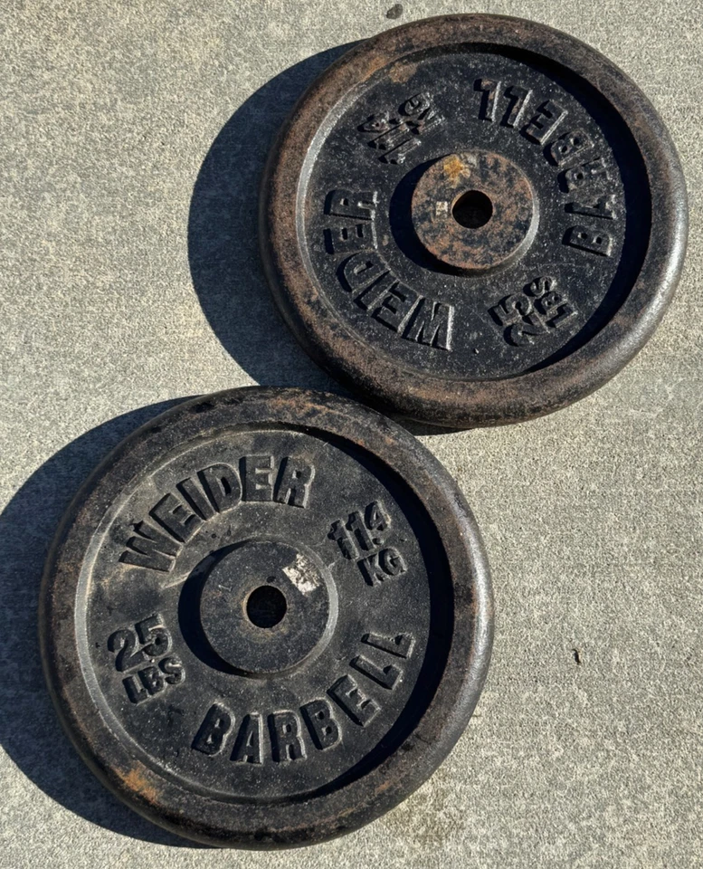 Par de placas de peso vintage WEIDER de 25 libras de peso 50 libras en total Foto 1 de 1